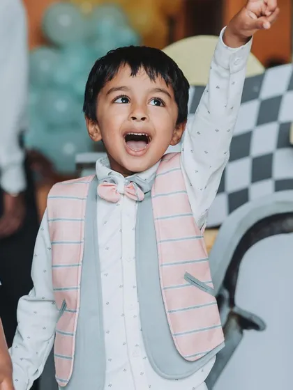 The pure excitement on a child's face during the magic show. This is the kind of joy I aim to create.