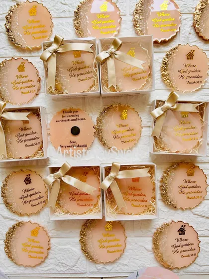 A new home, a new beginning. This photo shows a collection of housewarming return gift magnets that I shipped to the USA.