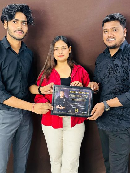 A proud moment with two of my students after they received their certificates.