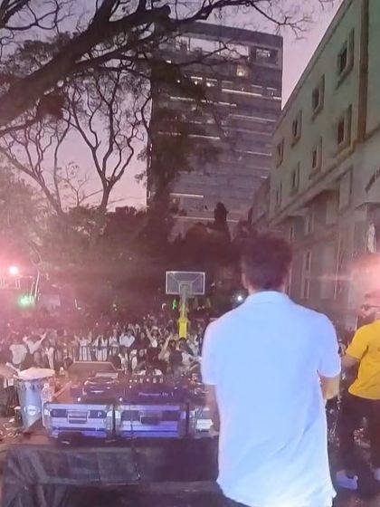 A moment of calm before the next big drop, on stage with the percussionists.