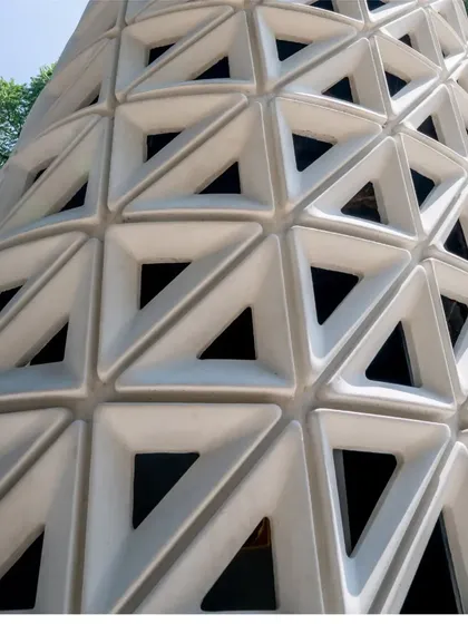 A detailed photograph of the modular panels that form the VERTO tower's skin. This modular product architecture allows for efficient shipping and on-site assembly.