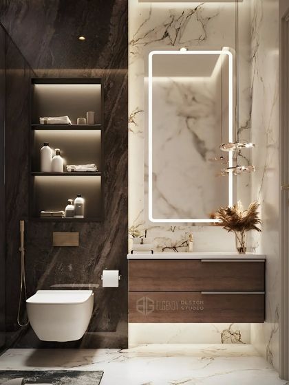 A luxurious bathroom design with a dark marble accent wall and a floating wood vanity. The rectangular mirror with integrated lighting adds a sleek, modern touch.