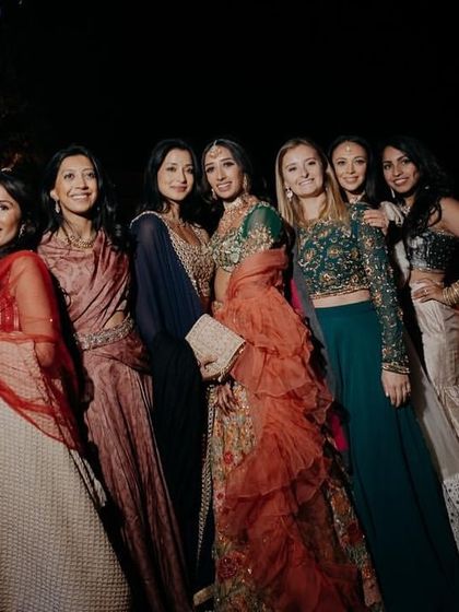 The bride and her bridesmaids, all dressed exquisitely for the Egyptian-themed Sangeet night.