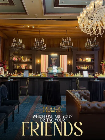 We can transform any space with a themed bar. This classic, library-style setup with rich wood, leather seating, and elegant chandeliers created a warm and sophisticated speakeasy vibe.