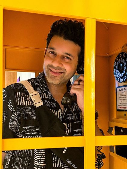 Having some fun in a classic phone booth. It's a reminder that my job is all about communication and connecting with people.