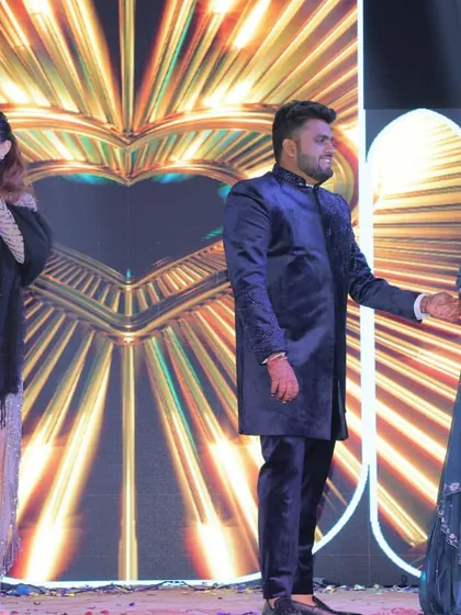 On stage at an anniversary celebration, interacting with the lovely couple. Whether it's a wedding or a milestone anniversary, I bring the same level of energy and personalized touch.