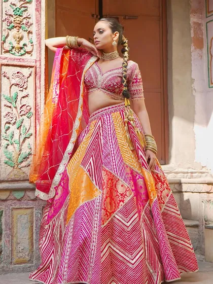 A stunning patchwork lehenga in shades of pink and orange. This piece from my Chandni Chowk inspired collection is a beautiful blend of traditional patterns.