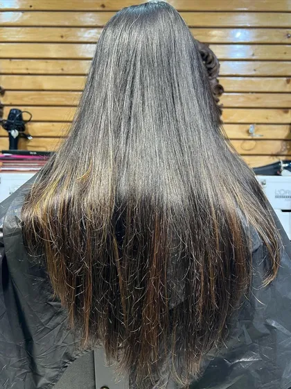 The client's hair before the caramel brunette balayage transformation.