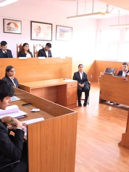 A wide view of the moot court in session at The NorthCap University. This setting simulates a real courtroom, giving students invaluable practical experience in legal advocacy.
