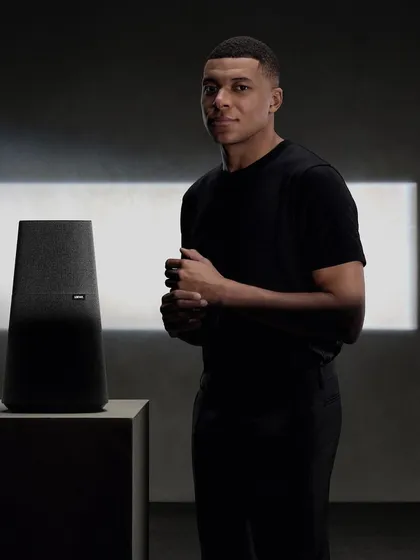 Football star Kylian Mbappé with the Loewe klang mr speaker. This collection is perfected for design lovers who don't want to compromise on audio quality.