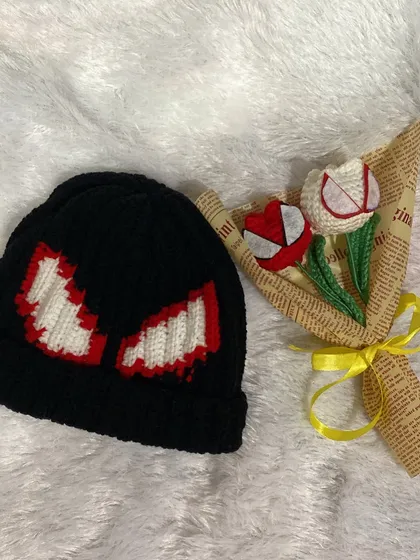 For all the Spider-Man fans out there! This set includes a custom crochet beanie with the iconic spider eyes and a matching bouquet of Spidey-themed tulips.