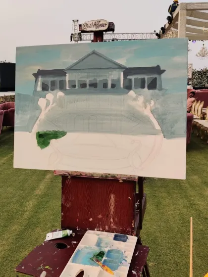 The initial block-in stage of the Falaknuma Palace painting. We start by sketching the architecture and laying down the base colors.