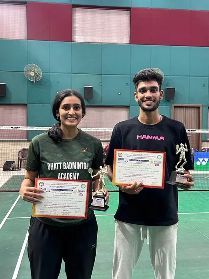 Pradeep Chaudhary and Shailja Shukla with their trophies after winning the Mixed Doubles gold at the UP Senior State Badminton Tournament in Hapur.