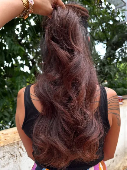 A fresh new look for this client. We did a full color transformation to this rich chocolate brown and finished with a healthy cut and bouncy blowout. The smile at the end says it all.