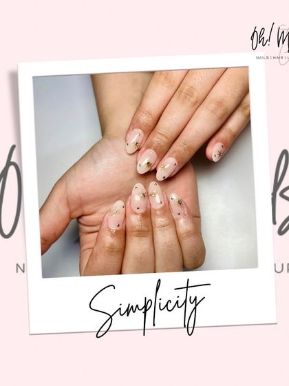 Simplicity and elegance. This minimalist design features a sheer, neutral base with delicate flecks of gold foil for a subtle and sophisticated touch of sparkle.