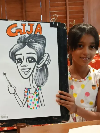 A young girl named Gija with her magical caricature. Adding names and fun elements like wands makes the drawing extra special for kids.
