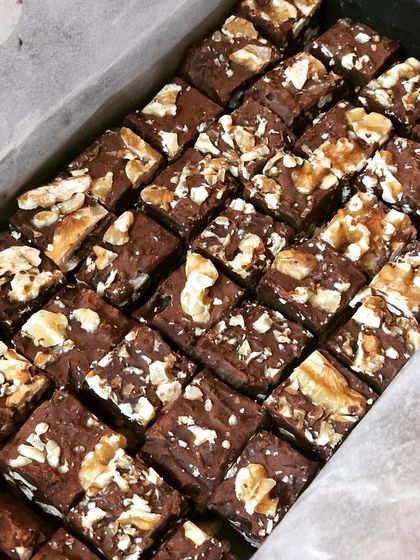 A full tray of my Walnut Chocolate Fudge, cut into perfect bite-sized squares and ready to be packed. I make these in large batches, especially during the winter, as they make for a wonderful, warming treat.