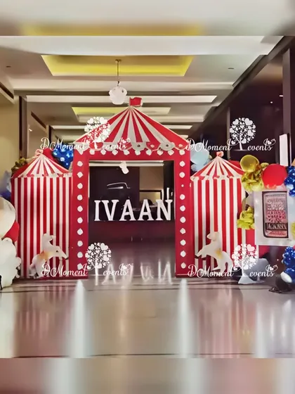 A grand entrance designed to look like a large circus tent with the birthday boy's name, "IVAAN," displayed prominently.