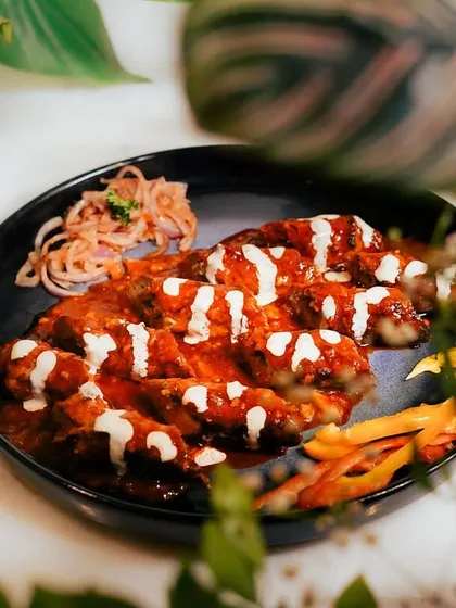 The Mutton Barra Seekh, plated with care. I focus on presentation to ensure every dish I serve is a masterpiece of taste and a feast for the eyes.