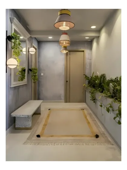 A hallway at Peninsula Heights where a long, built-in planter adds a continuous line of green. This biophilic corridor connects different parts of the home and makes the journey between rooms a pleasant experience.
