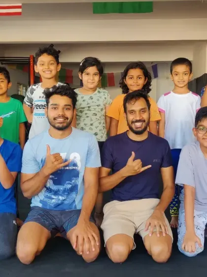 The smiles say it all. This is a group shot from one of our kids' MMA summer camps, where our "smool fighters" come together to learn, play, and grow as a team under the guidance of our expert coaches.