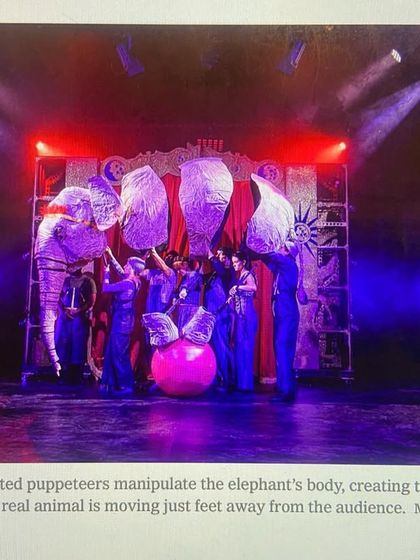 A stage photo showing the incredible puppetry that brings the elephant to life. The music had to match this visual magic, creating a sense of awe and emotion for the audience.