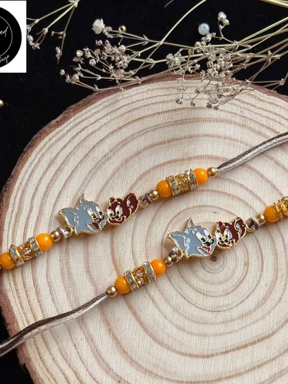 For the sibling duo that reminds you of Tom & Jerry. This playful rakhi captures the fun and 'nok-jhonk' of your childhood bond.