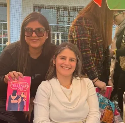 Another reader gets her book signed by Anu Singh Choudhary. We love creating these memorable moments where our members can connect directly with the authors who inspire them.