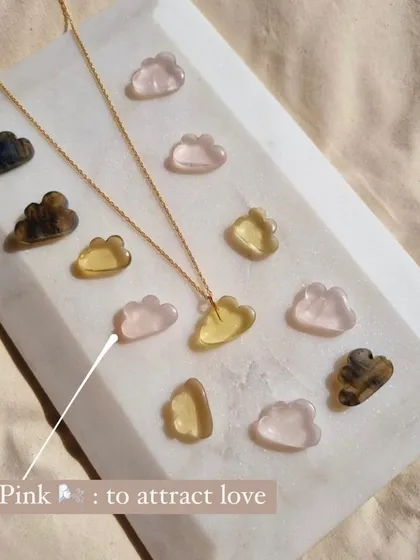 My candy cloud pendants are perfect for choosing the energy you need. This image highlights the pink rose quartz, a stone I use to attract love.