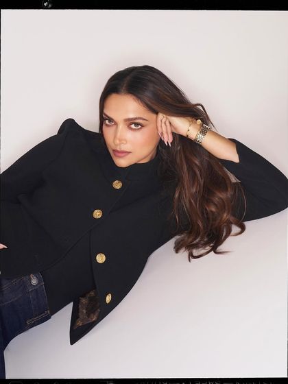 A full-body shot showcasing how seamlessly the press-on nails integrate into a high-fashion look, providing a quick and beautiful manicure solution.