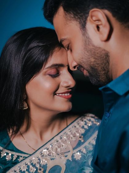 A romantic close up from a pre wedding shoot. The makeup is soft and enhances the couple's loving gaze.