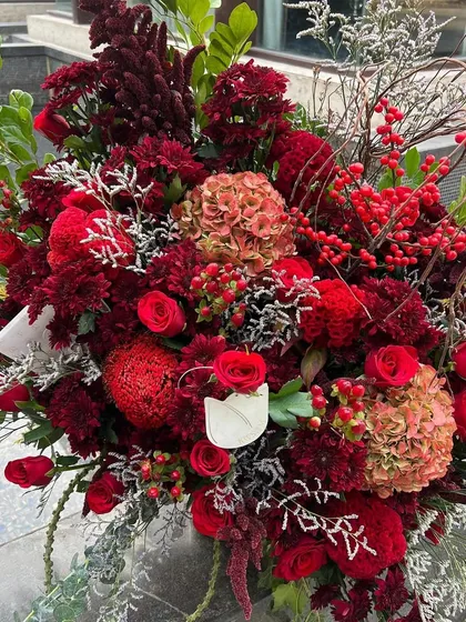 For an occasion as romantic as Valentine's, how many flowers are too many? This abundant all-red arrangement, full of texture and passion, is my answer.