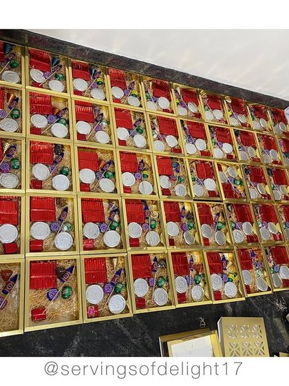 Packing up boxes of my famous edible firecracker chocolates for Diwali. They look just like the real thing but are so much tastier!