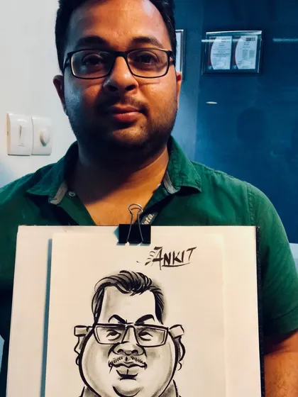 Another happy guest holding his caricature. My goal is to make art as expressive as the people I draw.