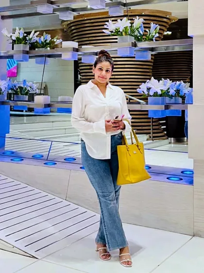 You can never go wrong with the ultimate classic: a crisp white shirt and a great pair of blue jeans. It’s a versatile foundation that I can help you style for any mood, whether it's for a casual meeting or a relaxed weekend.