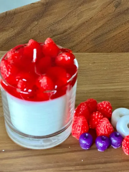This strawberries with jam dessert candle is a new favorite. It's made with gel wax for the jam and soy wax for the cream, and it smells incredible.