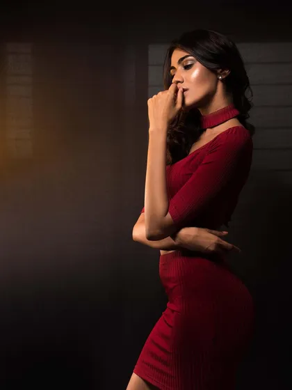 Styling Apeksha Porwal in this chic red co-ord set for a Christmas-themed shoot. The look is bold, festive, and modern, perfect for the holiday season.