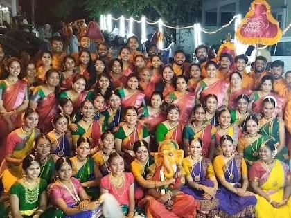 The entire performing team for the Bengaluru Ganesh Utsava, including singers and musicians. These large-scale street performances are a collaborative effort and a true community celebration.