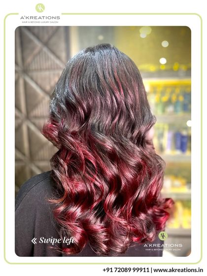 We created these rich, reddish highlights for a bold and beautiful statement. The color is vibrant at the ends, creating a stunning dip-dye effect.