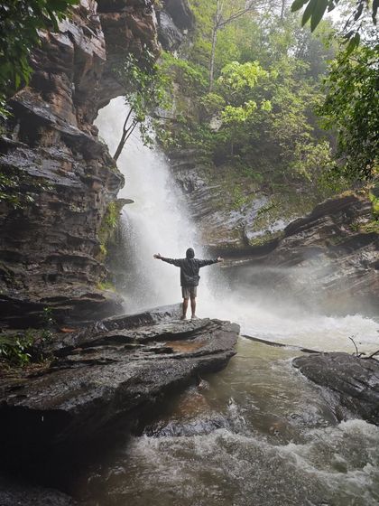 Feeling the spray of the waterfall. Our certified trek leads ensure you can safely get close to nature's power on our Sharavathi Valley treks.