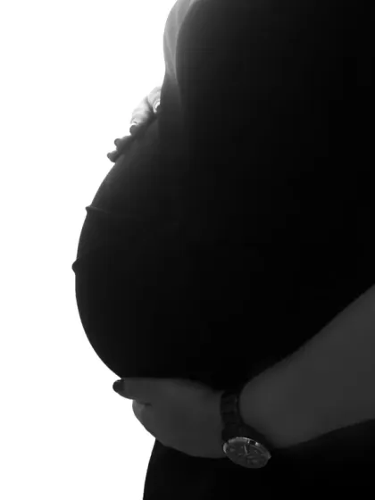 A close-up of the main event. This black and white silhouette of the baby bump is a simple, artistic, and powerful way to remember your pregnancy.