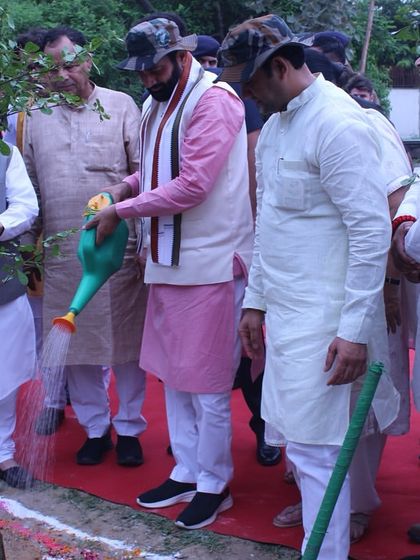 Hon’ble Chief Minister Shri Nayab Singh Saini and other dignitaries participate in the tree planting ceremony, watering the new saplings to mark their commitment to a greener Haryana.