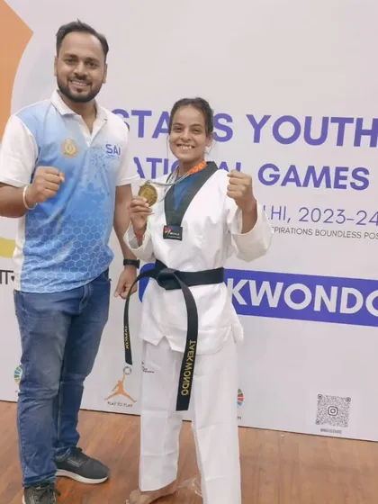 A proud moment with one of our gold medalists at the Stairs Youth National Games. Our coaching focuses on building the mental and physical strength needed for top-tier competitions.