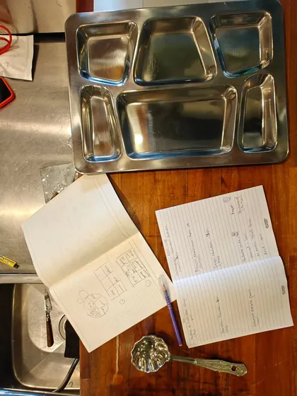 Marathi Mulgi in Japan! Taking my food to Japan for a culinary exchange was a dream come true. This is a picture of my prep notes and the traditional thali plate we used.