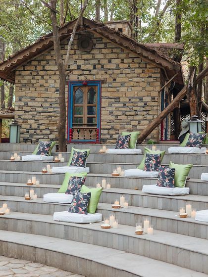 The unique amphitheater-style seating for a wedding ceremony, with candles lining the steps.