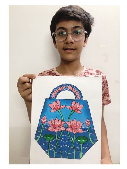 The student who created the lotus handbag design. His work shows precision and a great sense of aesthetics.