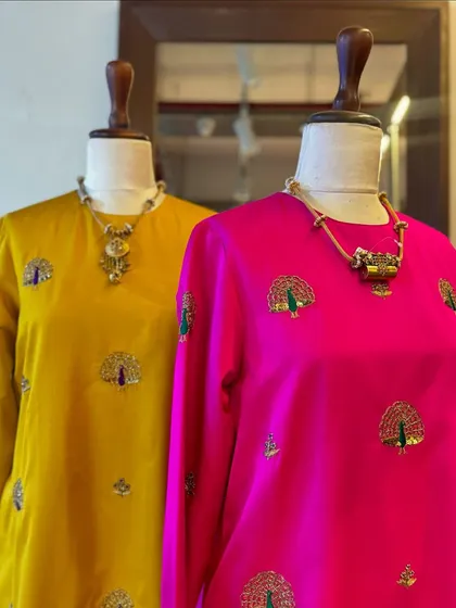 Another angle of the Raw Mango kurtas, highlighting the rich texture of the silk and the elegant simplicity of the silhouette.