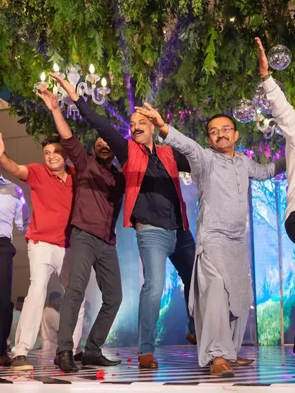 The bride's father and his gang proving that they are the best. A high-energy performance that shows age is no barrier to having fun on the dance floor.