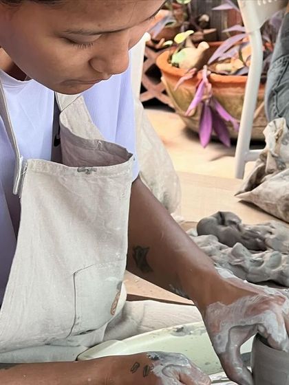 The beautiful concentration of students learning to throw on the wheel. It's a proud moment for me to see them so engaged and passionate about learning this art form.