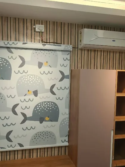 This custom-printed roller blind with a whale pattern was installed in a child's bedroom. I can source and fit various printed designs to match any theme you have in mind.